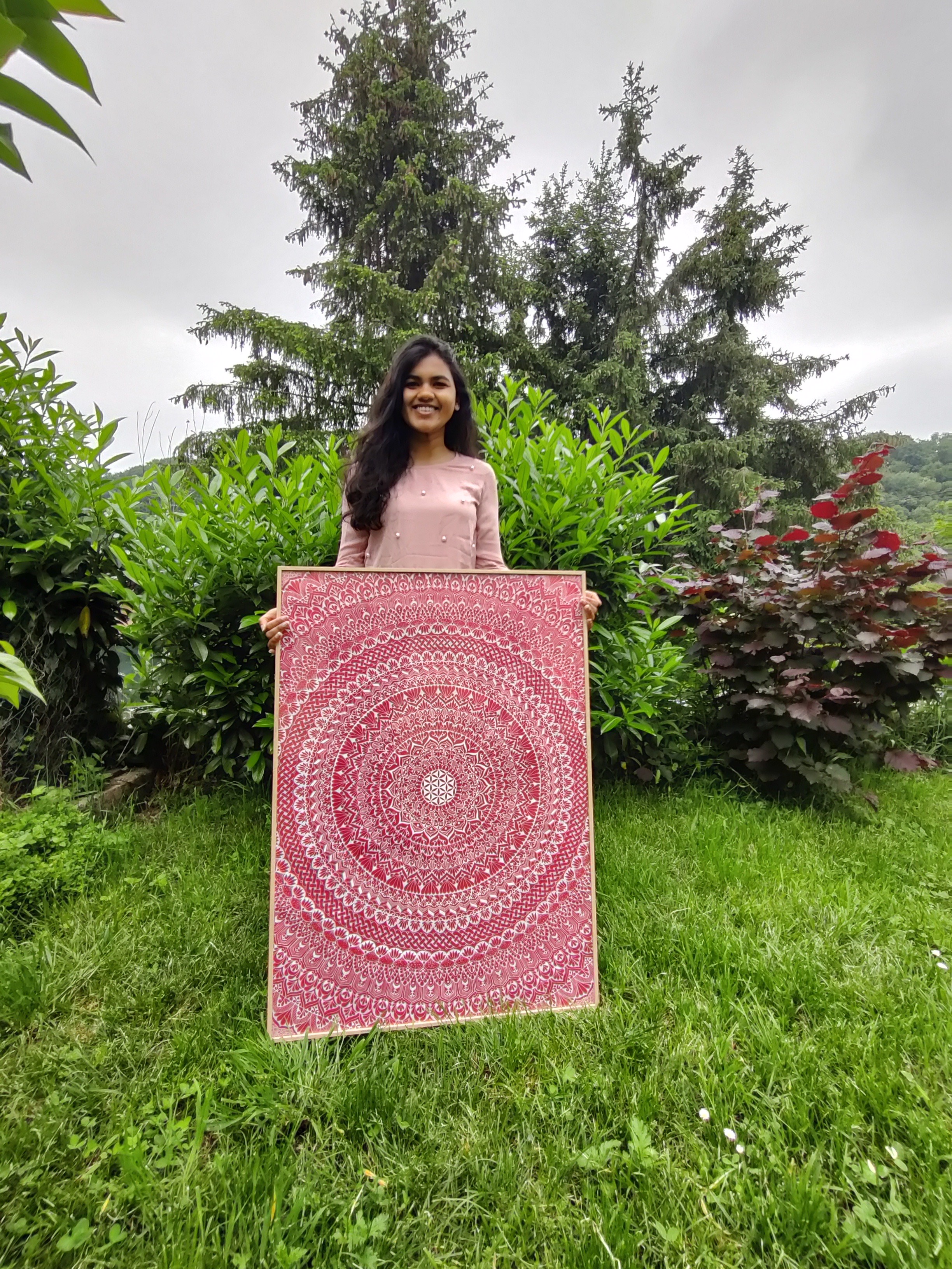 Dhvani creating mandala art